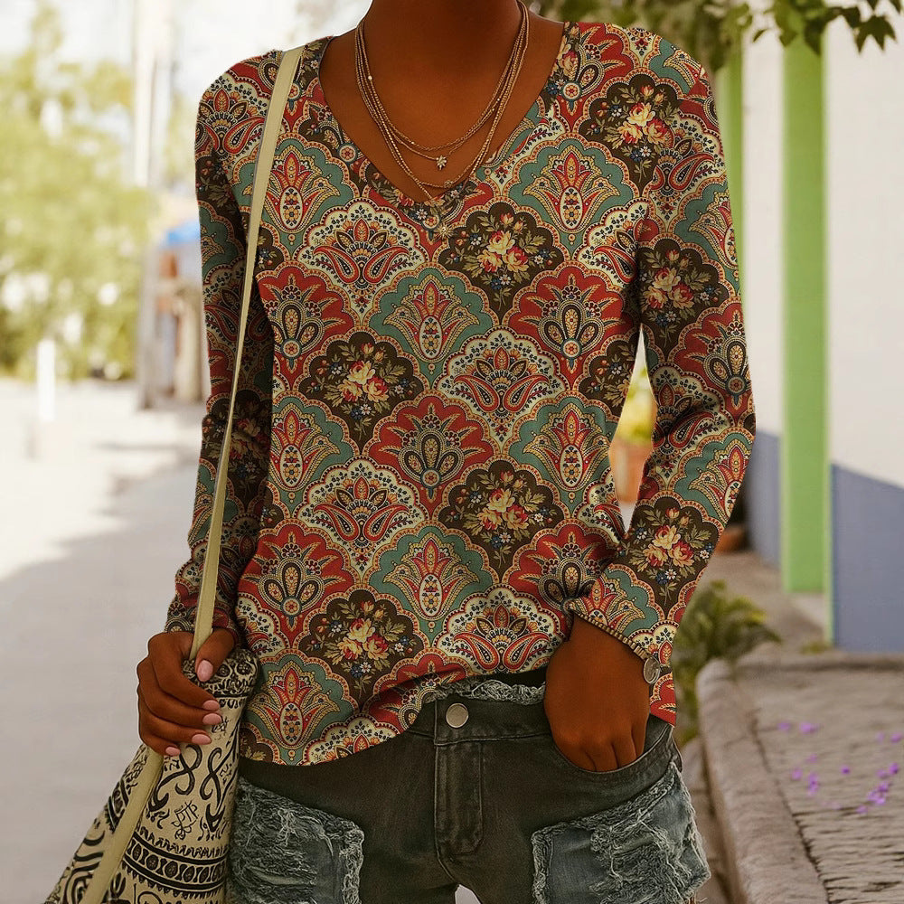 Women's ethnic print V-neck long-sleeve pullover top by FitiqueFit, featuring colorful intricate patterns and a relaxed fit.