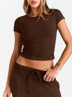 Women's round neck short sleeve T-shirt and drawstring lounge set, stylish two-piece set by Trendsi, featuring comfortable casual wear.