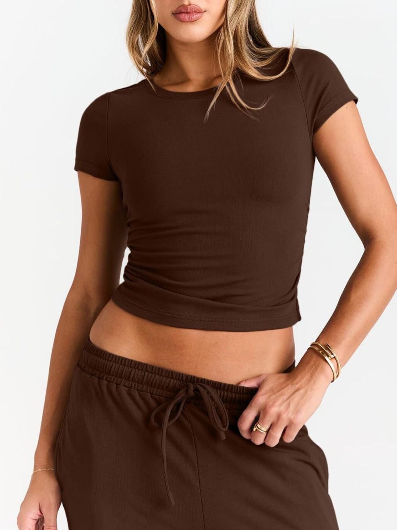 Women's round neck short sleeve T-shirt and drawstring lounge set, stylish two-piece set by Trendsi, featuring comfortable casual wear.