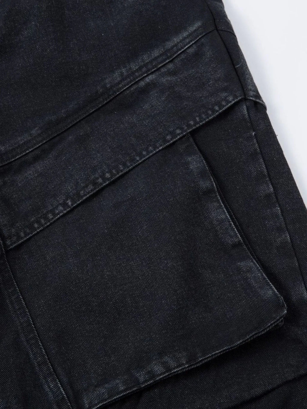 Men's wide leg denim jeans by Plush Fashion Shop, showing the relaxed fit and classic blue denim fabric.