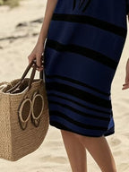 Plus size women's striped half-sleeve midi dress by Plush Fashion Hub, casual chic everyday wear, featuring a comfortable fit and stylish design.