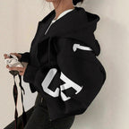 Women’s zip-up printed sweatshirt by FitiqueFit featuring long sleeves and a casual hoodie style, perfect for everyday wear.
