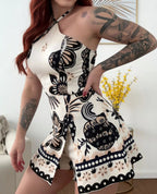 Floral print halter neck romper and matching shorts set by Plush Fashion Hub, perfect for stylish summer wear.