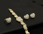 18K gold heart-shaped pendant necklace and matching earrings set by Plush Fashion Hub, elegant women’s jewelry gift set.