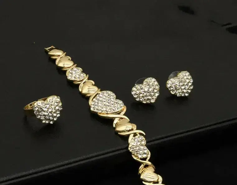 18K gold heart-shaped pendant necklace and matching earrings set by Plush Fashion Hub, elegant women’s jewelry gift set.