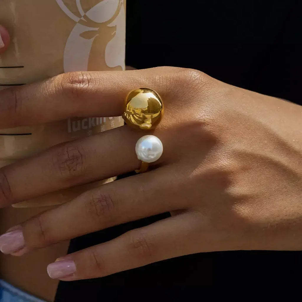 18K gold-plated celestial pearl and orb open ring, adjustable statement jewelry from Plush Fashion Hub with intricate design.