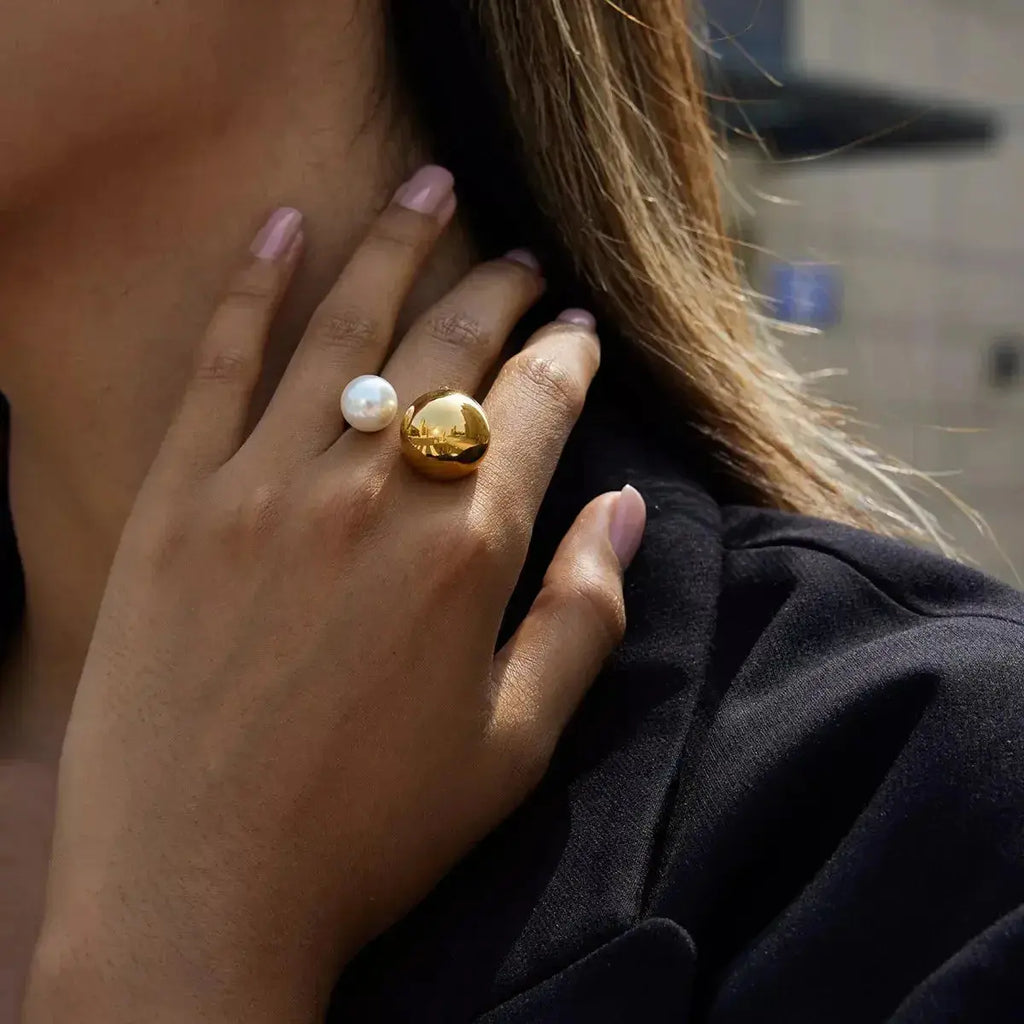 18K gold-plated celestial pearl and orb open ring showcasing adjustable statement jewelry design by Plush Fashion Hub.