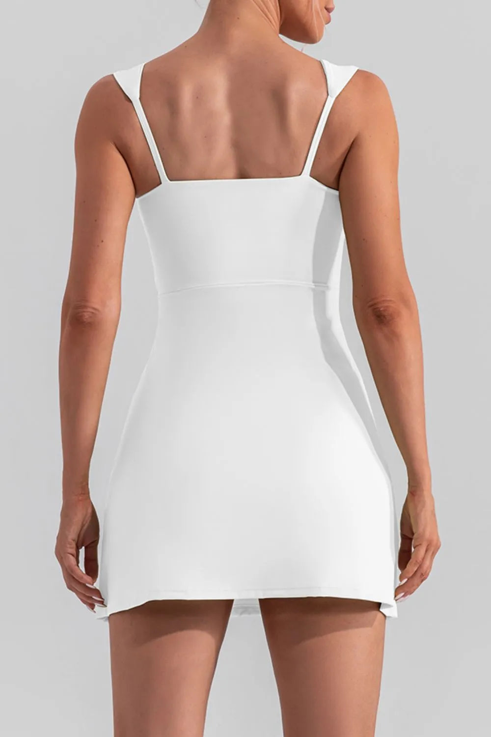 Square neck sleeveless slit mini active dress by Trendsi, featuring a fitted design perfect for workouts or casual wear.