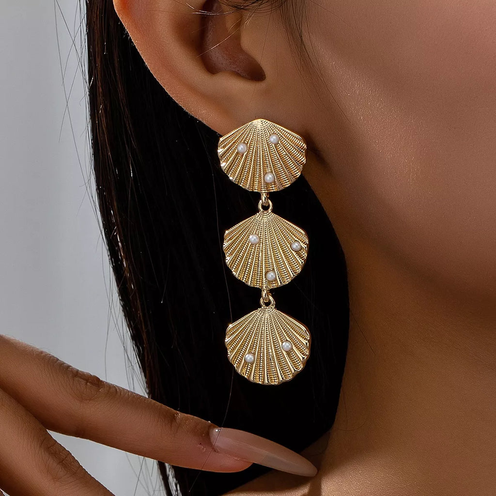 Seashell dangle earrings with pearl accents, stylish jewelry by Shopimist featuring natural shell and pearl details.