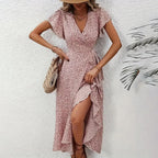 Flowy summer floral boho maxi dress with short sleeves and ruffle details by FitiqueFit, perfect for casual warm-weather wear.