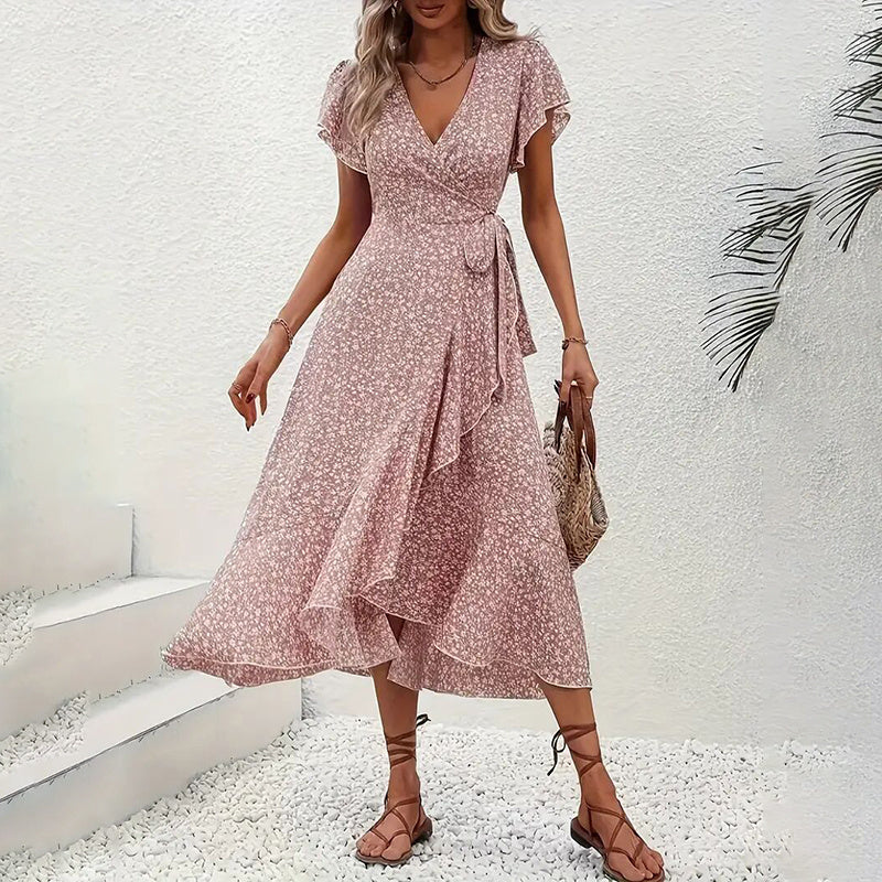 Flowy summer floral boho dress by FitiqueFit featuring short sleeves, ruffles, and a maxi length perfect for casual wear.