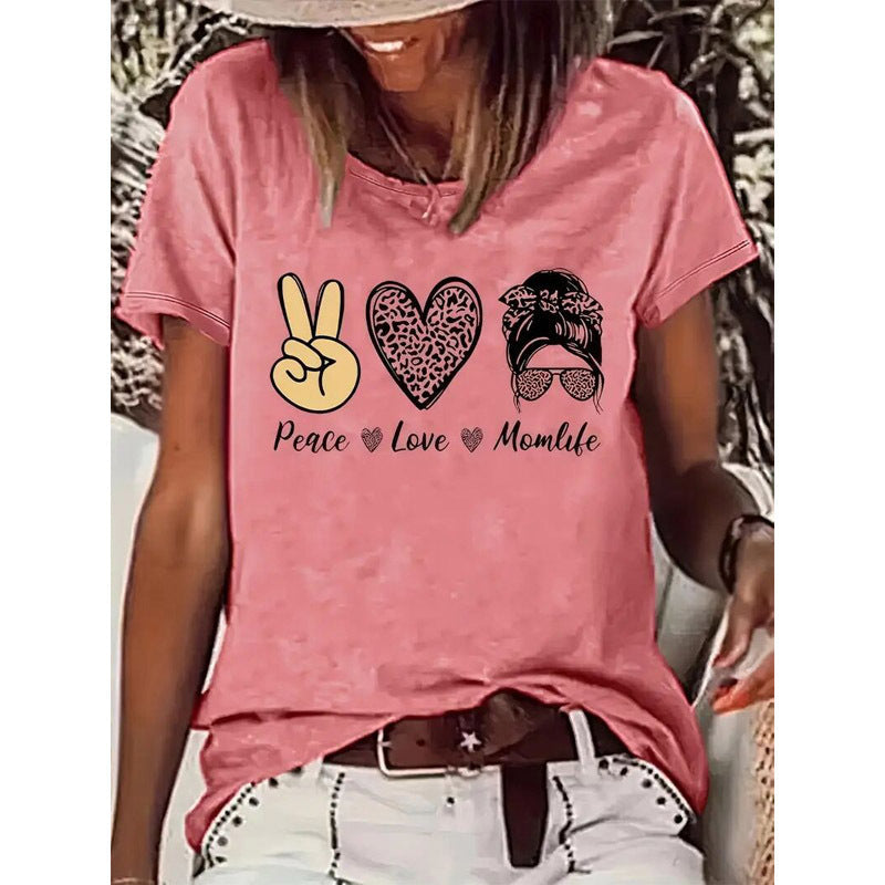 Round neck graphic short sleeve T-shirt from Plush Fashion Hub, casualwear with a stylish graphic design on front.