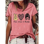 Round neck graphic short sleeve T-shirt from Plush Fashion Hub, casualwear with a stylish graphic design on front.