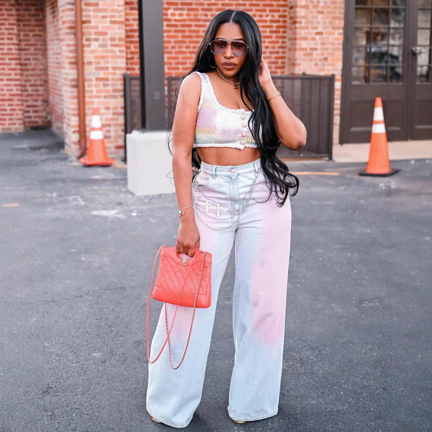 Gradient blush denim jeans by Plush Fashion Hub, showing a stylish pair of blue and pink gradient wash jeans.