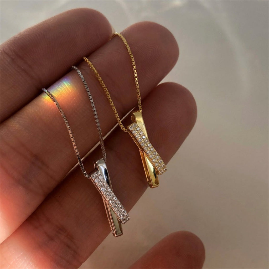 925 sterling silver zircon pendant necklace with a sparkling gemstone, featuring a delicate chain and elegant design.