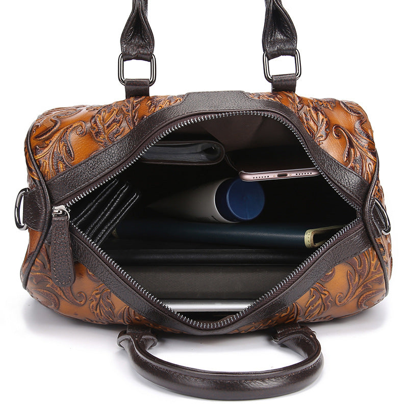 Plush Fashion Hub casual handbag with a sleek design, featuring a top handle and adjustable shoulder strap in neutral tones.