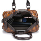 Plush Fashion Hub casual handbag with a sleek design, featuring a top handle and adjustable shoulder strap in neutral tones.
