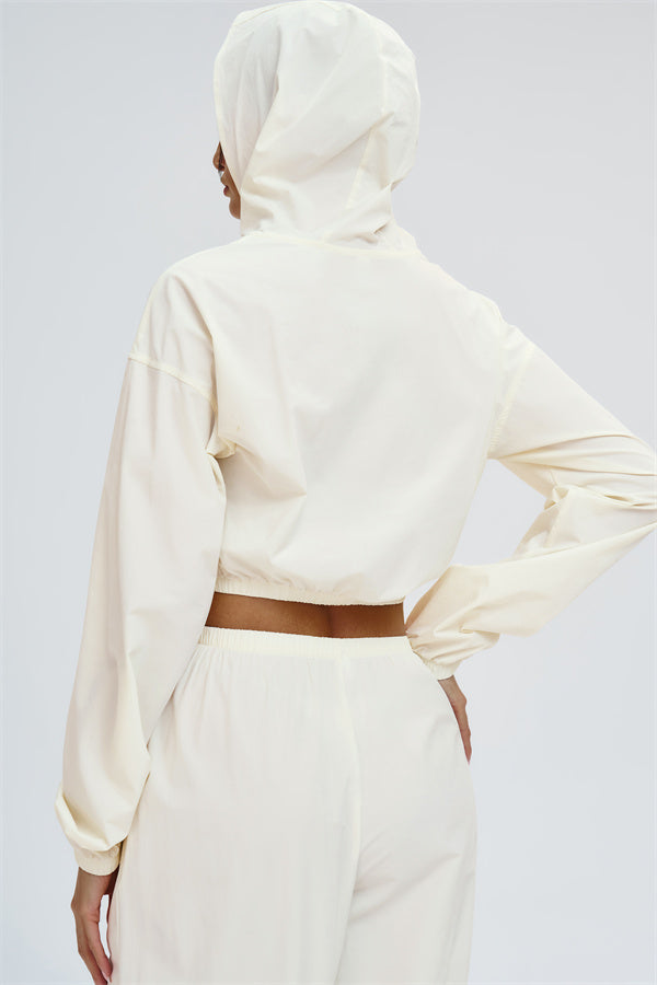 Fitglutes Activewear UV protection crop hoodie from The Svelte series, featuring a fitted style and breathable fabric.