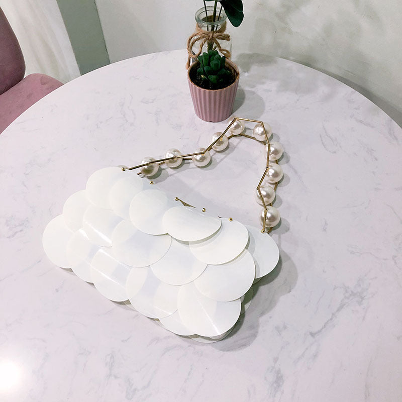 Platinum sequined beaded handmade pearl wafer bag with casual stringed design for women by Plush Fashion Hub