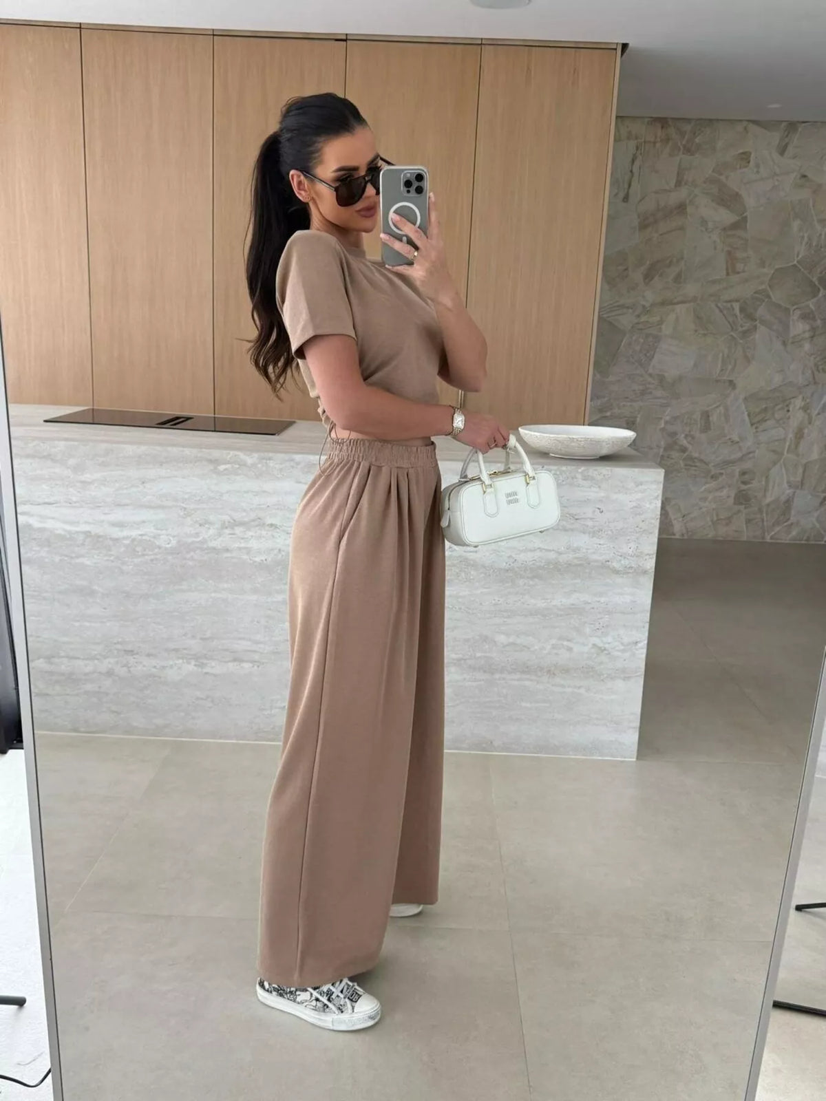 Drawstring crop top and wide-leg pants set by Plush Fashion Hub, featuring a stylish matching two-piece outfit with comfortable fit.