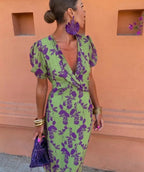 Women's fitted printed ruched maxi dress with V-neck and short sleeves by FitiqueFit, showcasing a stylish, elegant design.