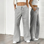 Women's striped print straight wide-leg casual pants with pockets, made by FitiqueFit, shown in a relaxed, full-length view.