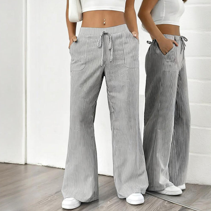 Women's striped print straight wide-leg casual pants with pockets, made by FitiqueFit, shown in a relaxed, full-length view.