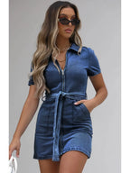 Plus size VYSN denim dress with short sleeves and full zip front, casual fashion clothing, shown in dark blue denim fabric.