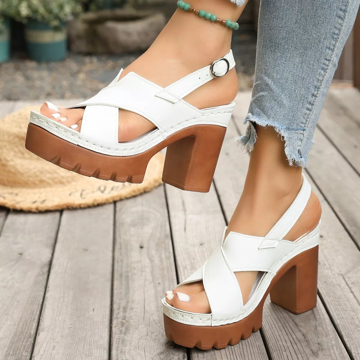 Open toe block heel sandals in neutral tones with sleek straps, stylish Trendsi shoe perfect for summer outfits.