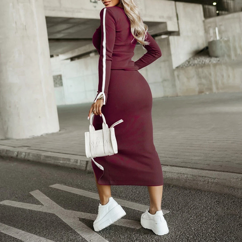 Women’s casual 2-piece skirt set by Plush Fashion Hub featuring a long sleeve sweatshirt and midi skirt, shown on a model.