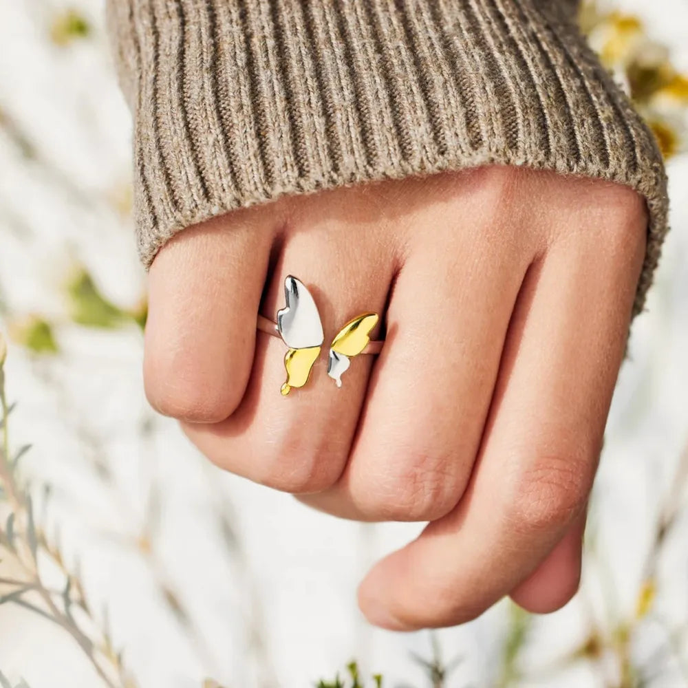 Sterling silver butterfly ring with intricate detailing, featuring a delicate butterfly design, crafted by Plush Fashion Hub.