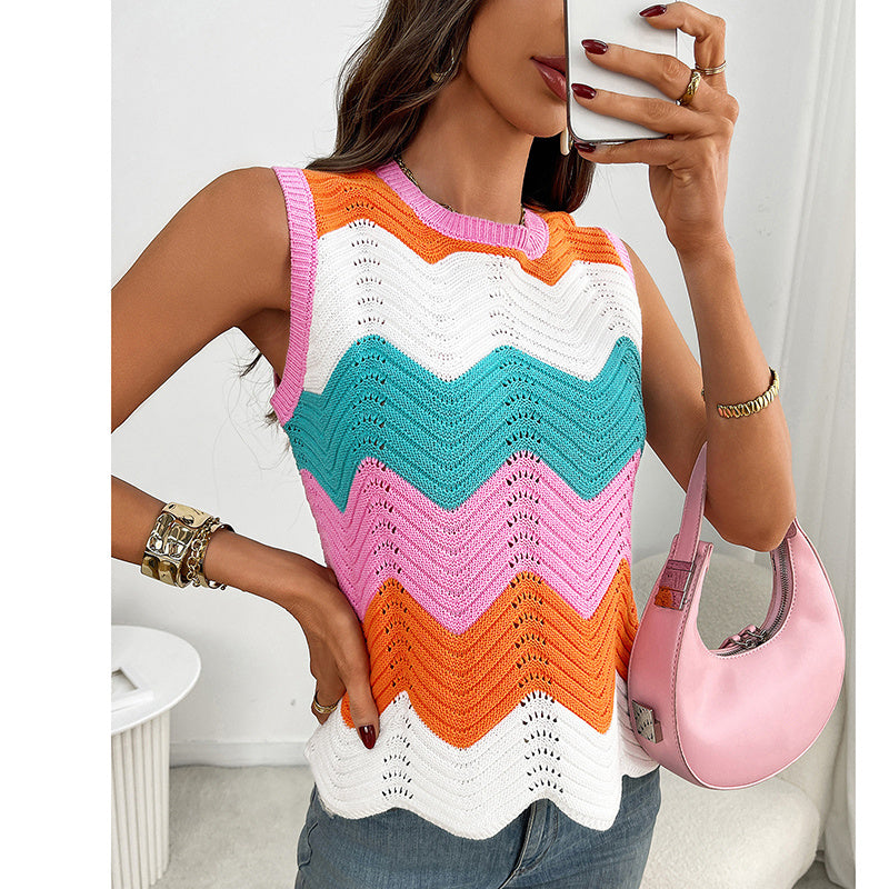 Women’s rainbow-striped cropped sweater vest by FitiqueFit, casualwear with colorful, striped knit pattern and a relaxed fit.