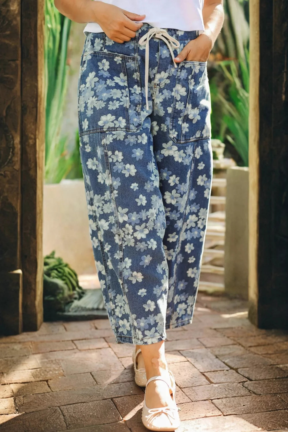 Dainty floral printed drawstring barrel jeans from Plush Fashion Hub, showcasing the relaxed fit and floral design.