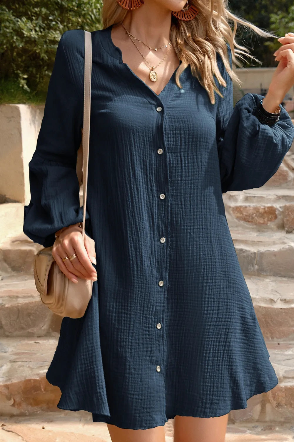 Devine notched balloon sleeve cotton mini dress by Trendsi, featuring a feminine design with puffed sleeves and a fitted silhouette.