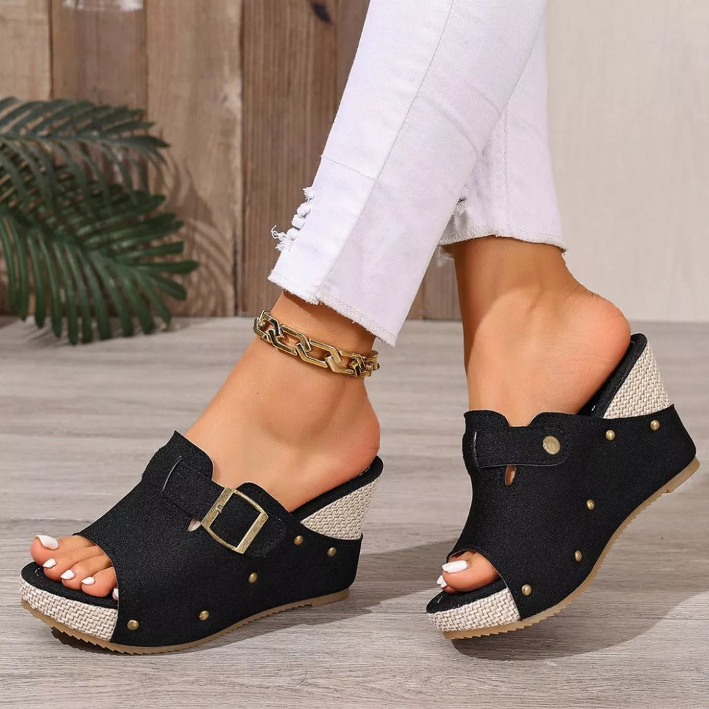 Open toe wedge sandals by Plush Fashion Hub featuring a stylish design with a comfortable wedge heel and open toe detail.