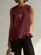Plus size Shopimist scalloped hem sleeveless tank top with a full size fit, featuring a stylish scalloped neckline and armholes.
