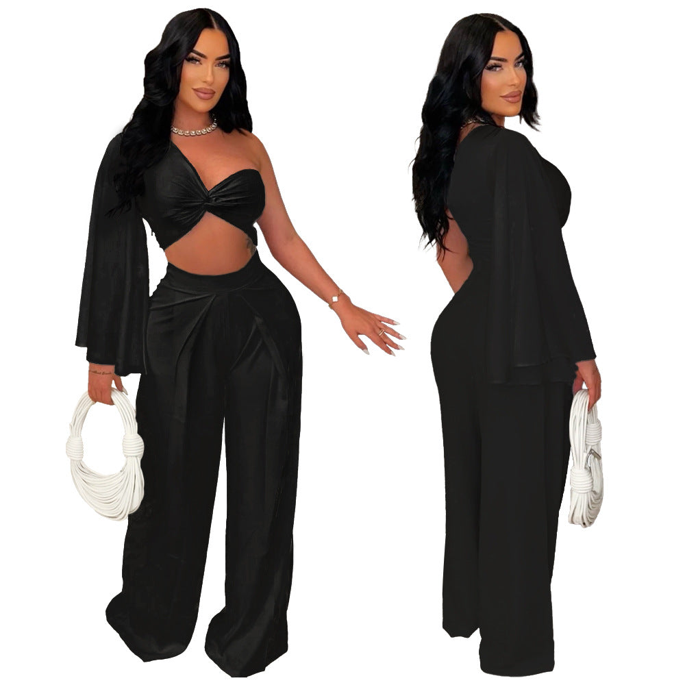 Asymmetrical pleated one-shoulder top and matching trousers from Plush Fashion Hub, stylish women's fashion set.