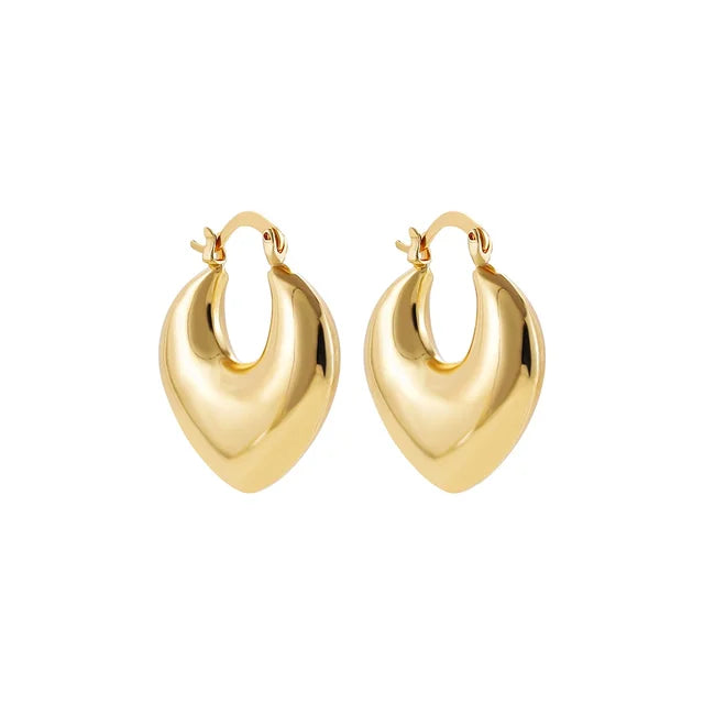 Polished gold metal heart-shaped hoop earrings with hinged latch closures.