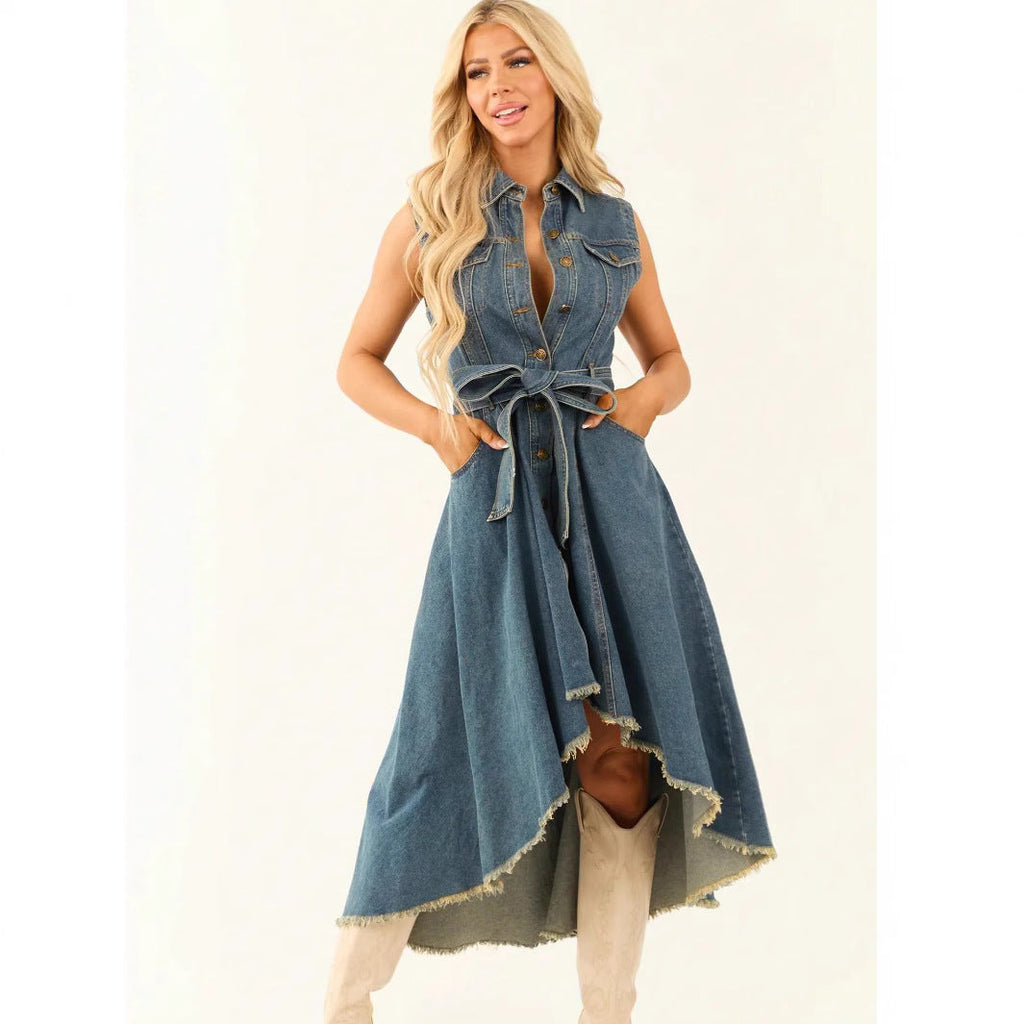 Women's sleeveless denim midi dress by FitiqueFit with irregular hem and button-front detail, shown on a model.