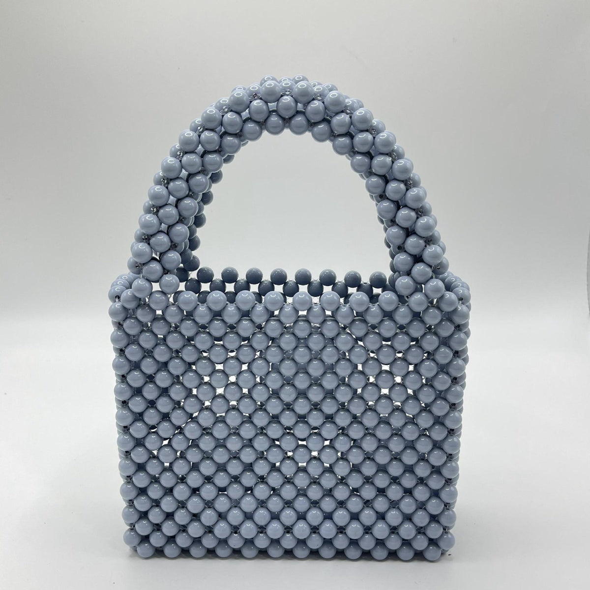 Eprolo beaded handbag with solid color design, featuring intricate beadwork and a stylish, elegant hand-held bag for fashion.