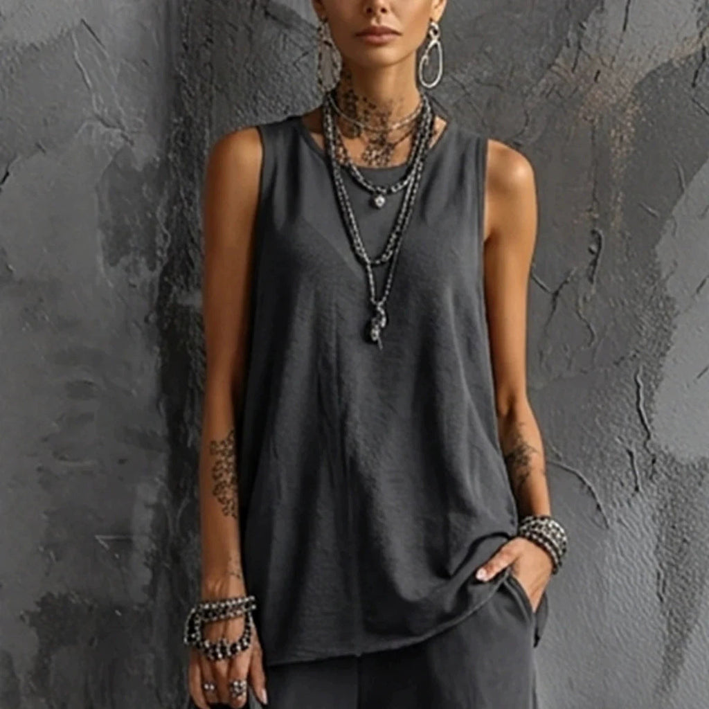 Women's sleeveless tank top and cropped ankle pants set from Plush Fashion Hub, casual two-piece outfit on a model.