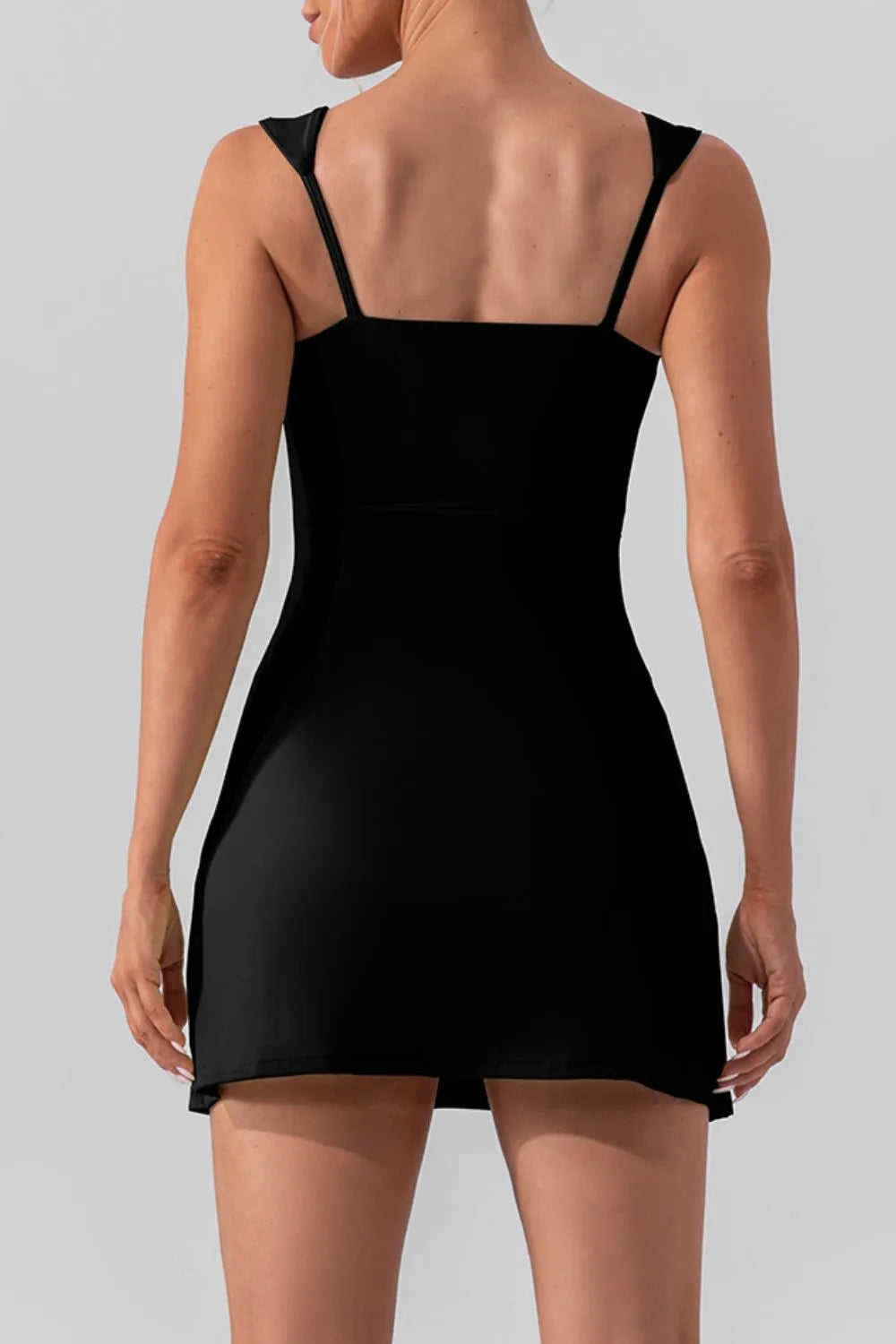 Square neck sleeveless slit mini active dress by Trendsi, shown in a stylish fit ideal for workout or casual wear.