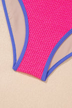 Threaded Pear Rory patchwork one-piece swimsuit with colorful mixed fabric panels, stylish and comfortable for beach or pool.
