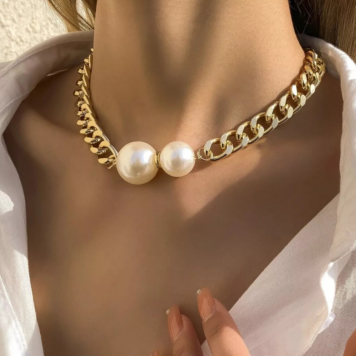 18K gold-plated pearl necklace by Simply Love featuring a string of lustrous white pearls on a delicate chain