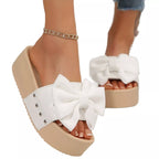 Women's chic bow decor platform sandals by Trendsi, featuring comfortable flat walking shoes with stylish bow details.