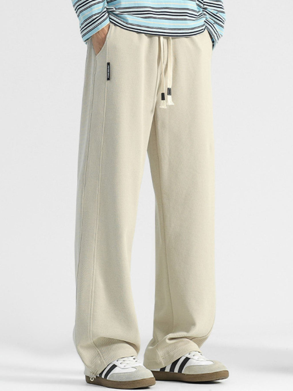 Men's plus size casual loose-fit drawstring pants by Shopimist, shown in a comfortable relaxed fit with elastic waistband and pockets.