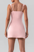 Square neck sleeveless slit mini active dress by Trendsi, shown in black with a fitted silhouette and athletic style.