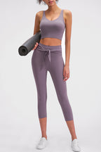 Millennia Scoop Back Sports Bra by Trendsi, activewear with a supportive fit, featuring a scoop back design and breathable fabric.