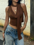 Elegant satin-feel cowl neck sleeveless blouse with ruched detailing, versatile camisole top by Trendsi.