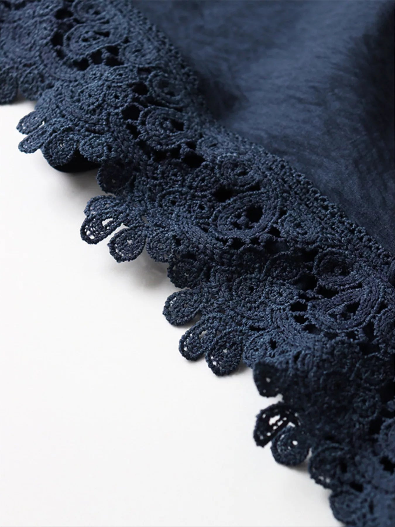 Lace trim cami and wide-leg pants matching set by Trendsi, featuring delicate lace details and flowy fabric.